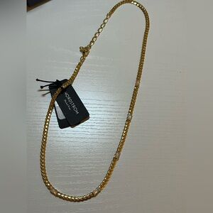 Gold curb necklace with Opal stations